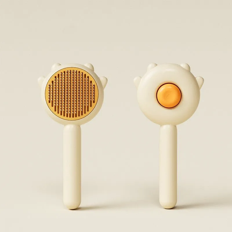 Gentle Paws™ Self-Cleaning Grooming Brush